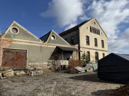 Voormalige textielfabriek op perceel van 5.493 m² in Walddorf - Duitsland