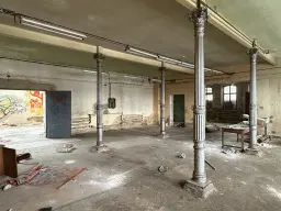 Voormalige textielfabriek op perceel van 5.493 m² in Walddorf - Duitsland
