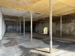 Voormalige textielfabriek op perceel van 5.493 m² in Walddorf - Duitsland