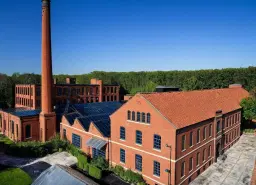 Voormalige textielfabriek op perceel van 5.493 m² in Walddorf - Duitsland