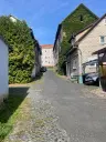 Hoekgebouw met voormalige supermarkt en 6 eenheden in Dermbach, Stadtlengsfeld - Duitsland